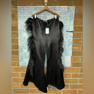 MARQUES' ALMEIDA
Feather-embellished kick-flare satin trousers size 10